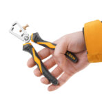 Close-up of hand holding Tolsen 6-inch industrial wire stripping pliers