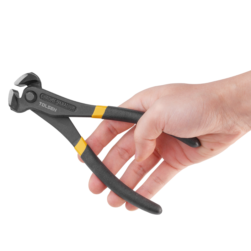 Close-up of hand holding Tolsen 7 inch end cutting pincer