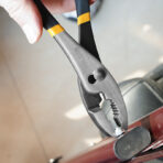 Close-up of Tolsen 8 inch slip joint pliers tightening bolt